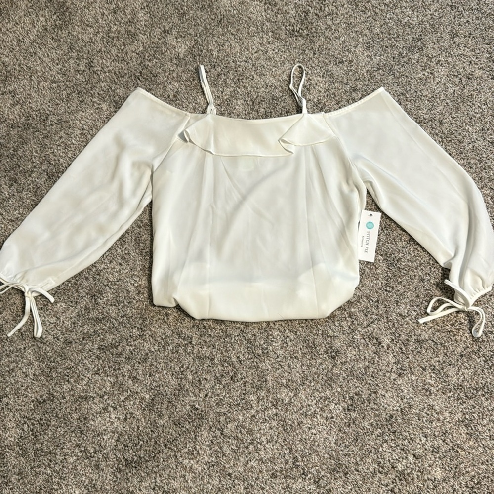 Ruffle detail cold shoulder blouse